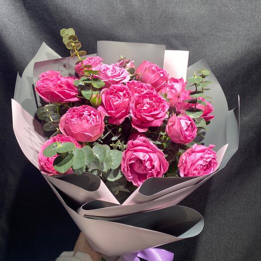 Bouquet of peony-shaped roses with eucalyptus