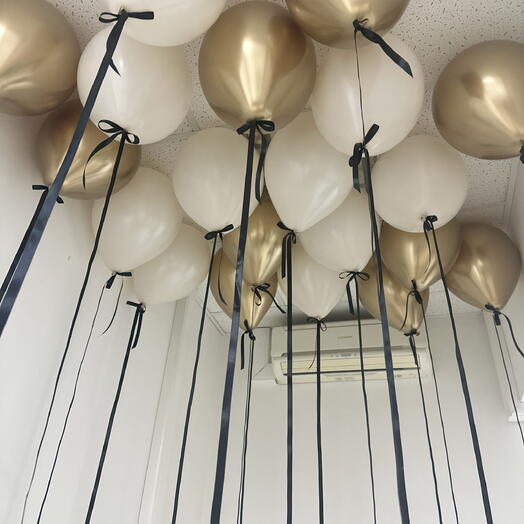 Balloons for the ceiling in gold and beige with bows 20 pieces