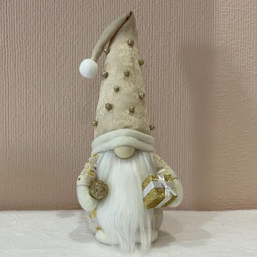 Gnomo navideño dorado brillante