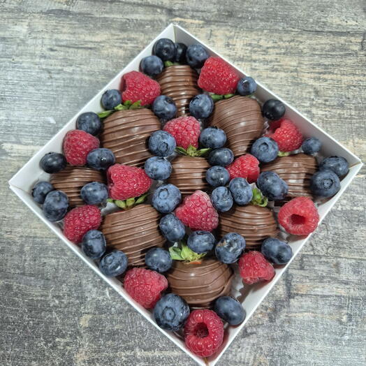 Chocolate-covered strawberries with berries