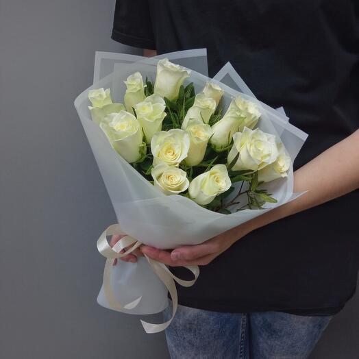 A compliment of 15 white roses