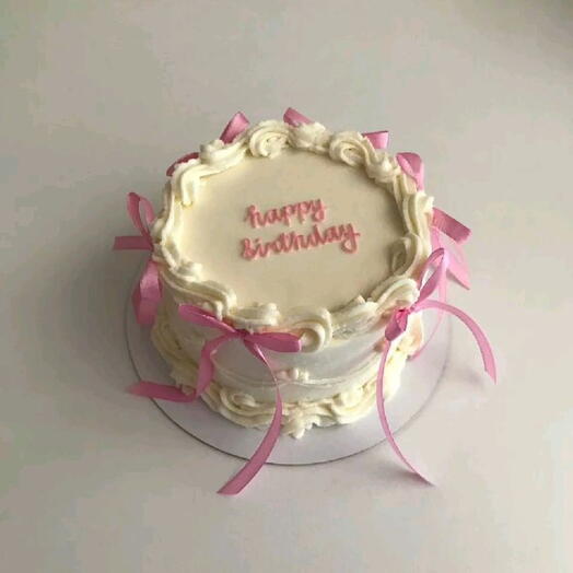 Off white Butter cream with Pink Ribbon Vintage cake