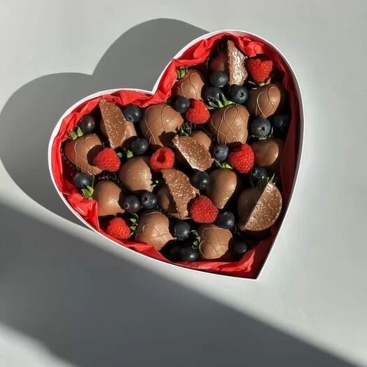Chocolate-covered strawberries in the shape of a heart on March 8th