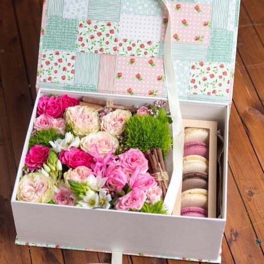 Flowers in a box with macaroons