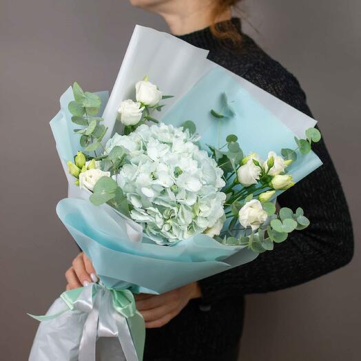 Delicate bouquet of blue hydrangea and eustoma