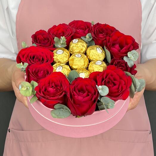 The composition is in the box. Red Roses and Ferrero Rocher candies (M)