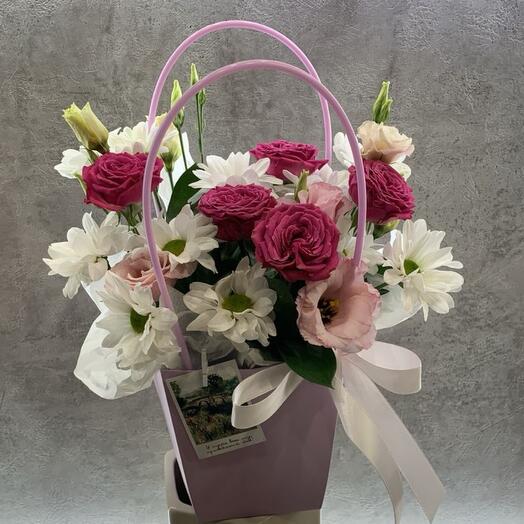 Flowers in a postcard bag
