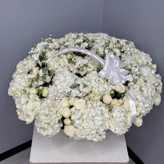 The most beautiful white basket of roses hydrangeas and eustomias