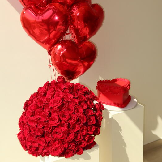 Set of- 100 red premium roses, cake with red velvet filling and heart shaped balloons