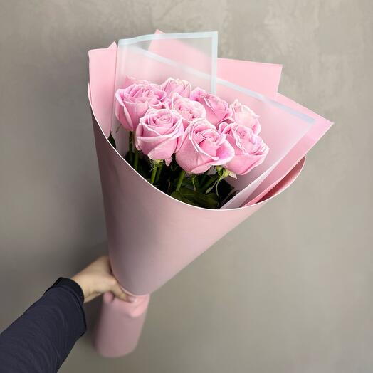 The rose is delicate pink