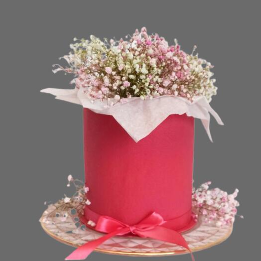 A cake box with fresh flowers