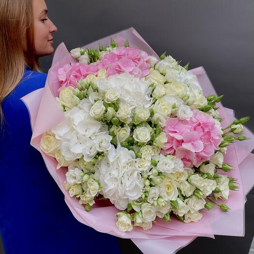 Big bouquet of white spray roses with hydrangeas