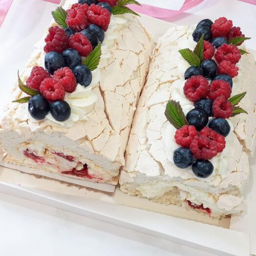 Meringue roll with buttercream and berry filling