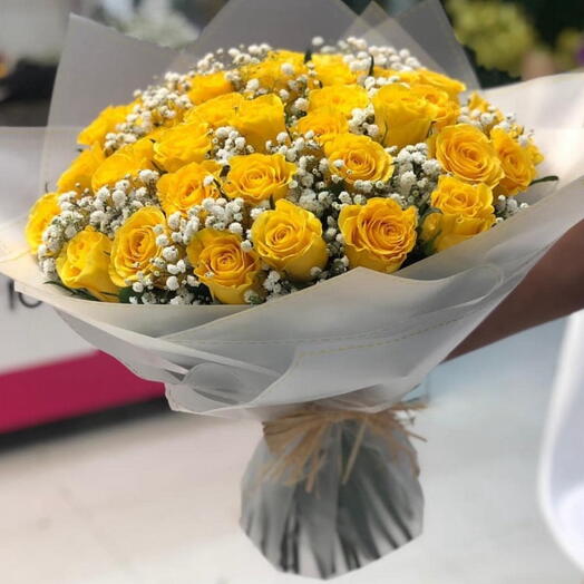 Yellow rose with white gypshofilla