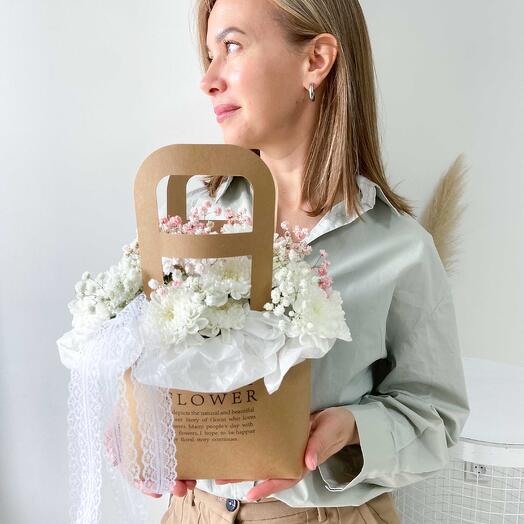 Chrysanthemum and gypsophila in a kraft bag