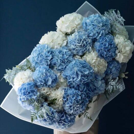 Bouquet of white and blue hydrangeas and eaglet