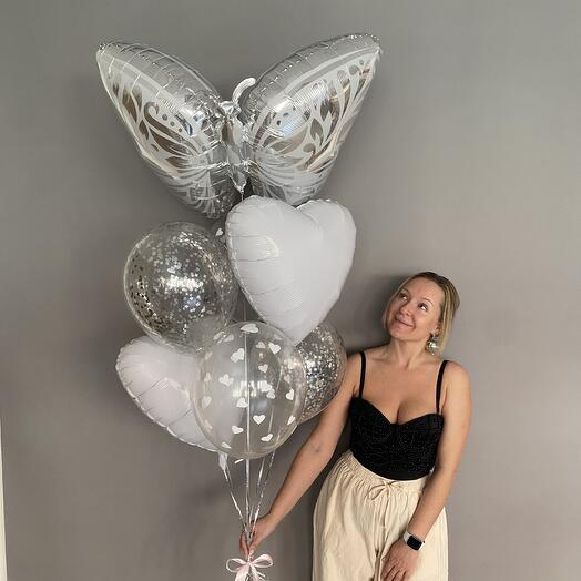Balloons on March 8th for a girl with a white bowtie