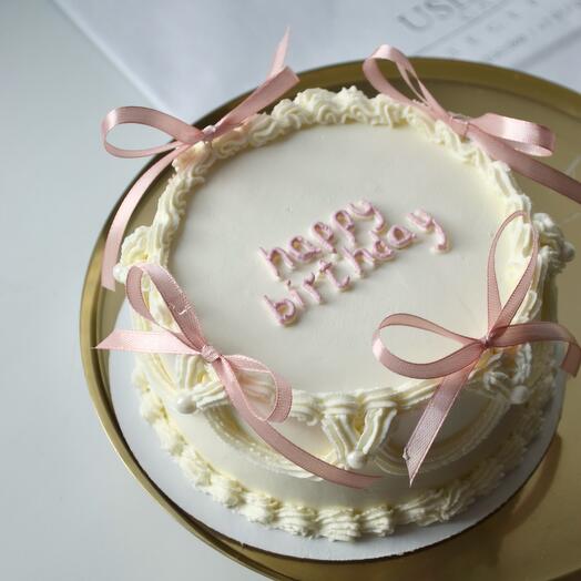 Pastel de Bento Lambeth con arcos y letras