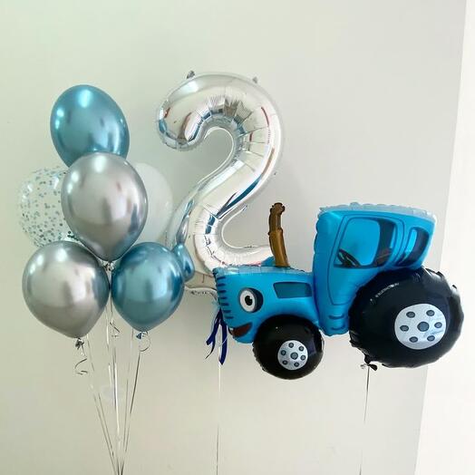 Синий трактор с цифрой и фонтаном