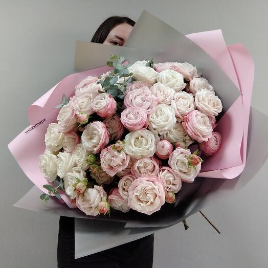 Peony-shaped roses and eucalyptus