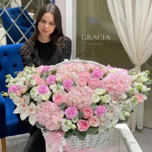 Basket with hydrangeas and orchids