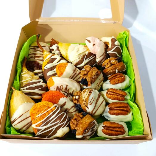 Assorted dried fruits in milk Belgian chocolate with pecans