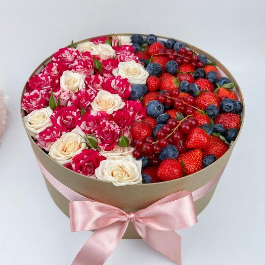 Roses and berries in a box
