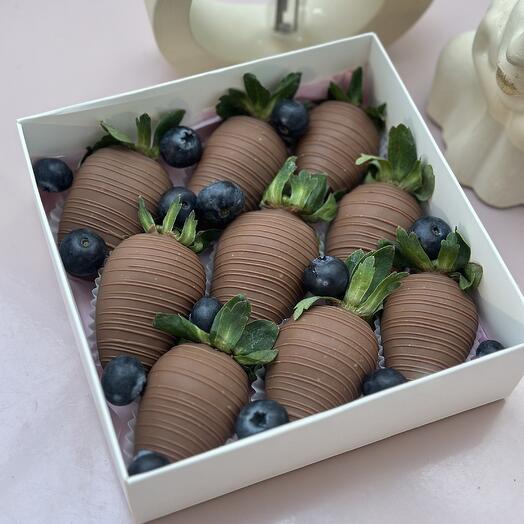 Chocolate-covered strawberries with blueberries