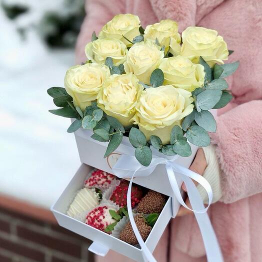 A small box with strawberries and white roses Romance