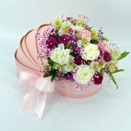 A bouquet of flowers in a wheelchair for the discharge of a girl's daughter from the hospital