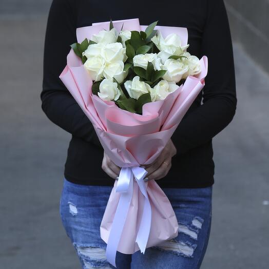 Bouquet of 15 white roses with greenery in a designer package