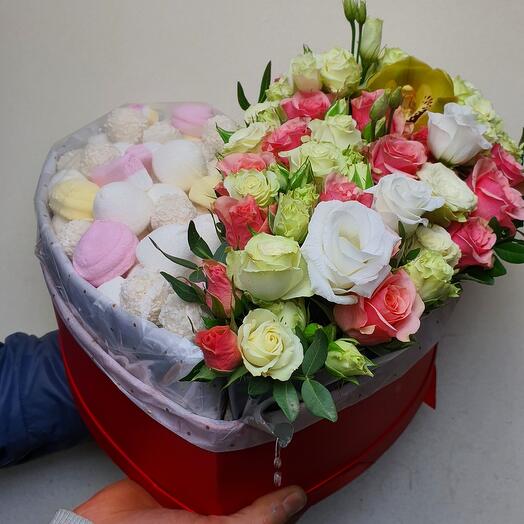 Sweets and flowers in the box