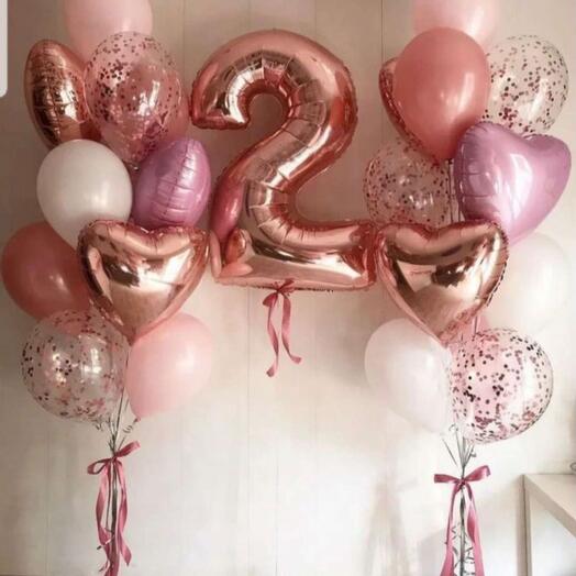 A set of helium balloons with a number