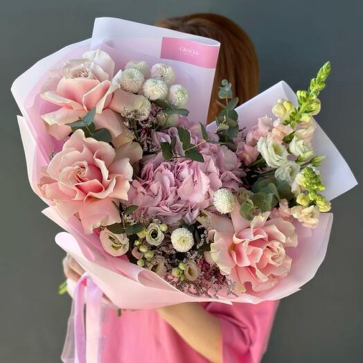 Delicate bouquet with French roses and hydrangea