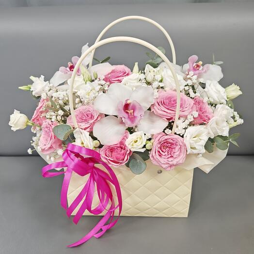 Delicate flowers in a cardboard handbag