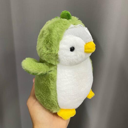 Пингвин в костюме динозаврика