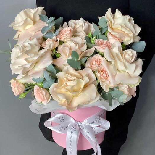 A box with Sharman roses and a bush rose "Romance"