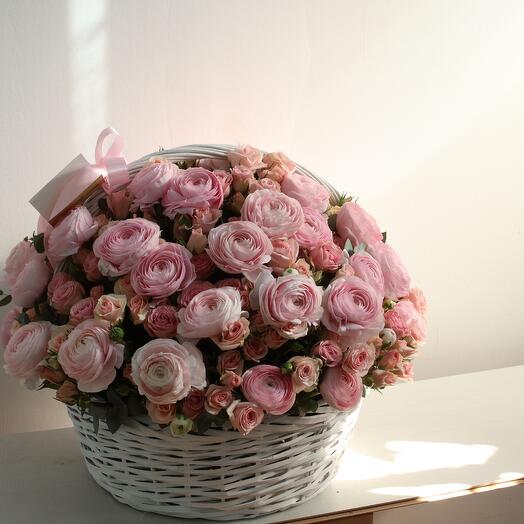 Tenderness itself is a basket of ranunculus and bush roses