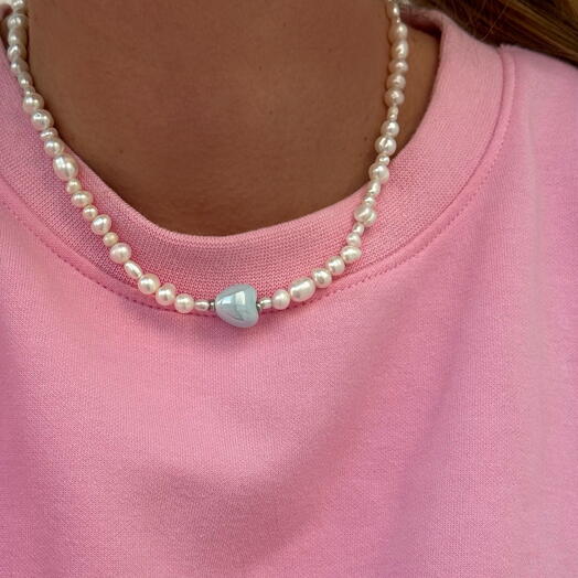 Natural pearl choker with a heart