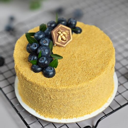 Classic honey cake with sour cream as a gift to mom, girlfriend, sister, dad