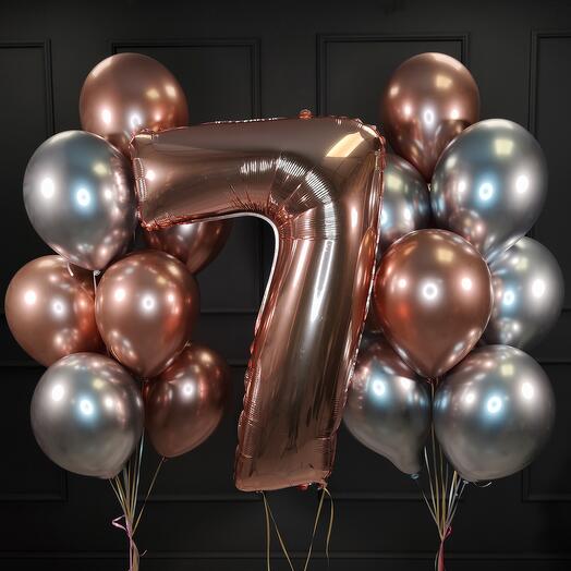 Composition of chrome balls with the number rose gold