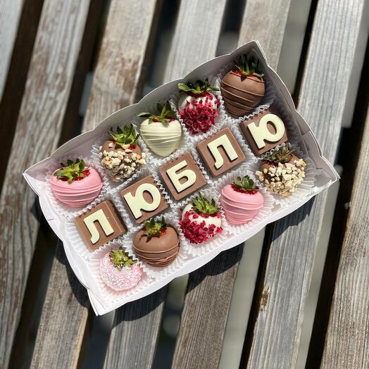 Chocolate-covered strawberries with chocolate letters