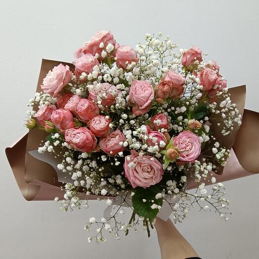 Bouquet of peony-shaped bush roses and gypsophila