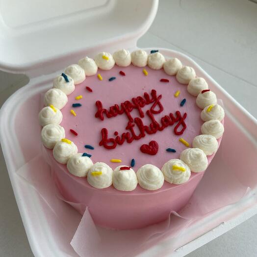 Pastel de Bento "feliz cumpleaños" con confeti