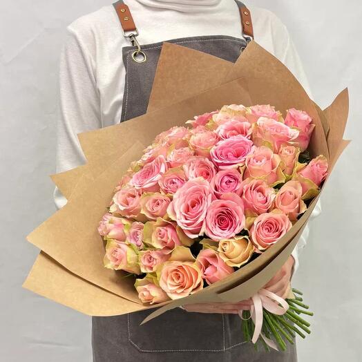 Bouquet of 55 green and pink roses in a craft package