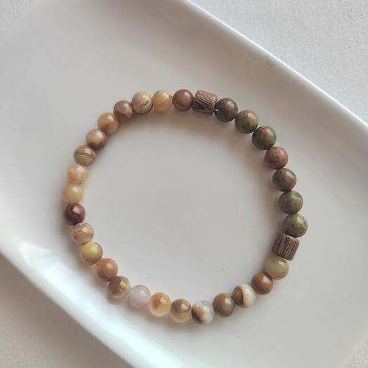 Браслет из мраморного оникса и унакаита