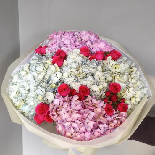 Hydrangea with a spray rose