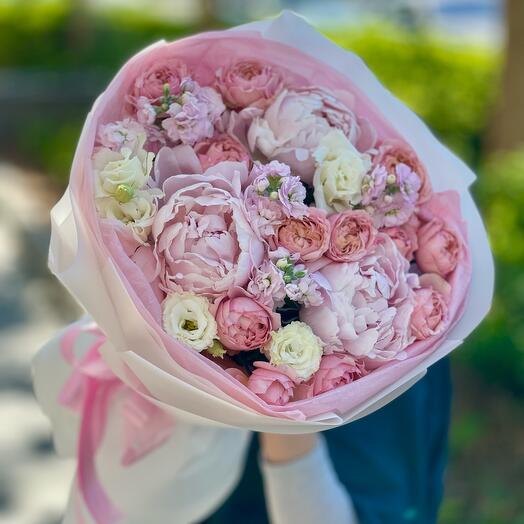 Delicate bouquet with peonies, peony-shaped roses and fragrant mattiola