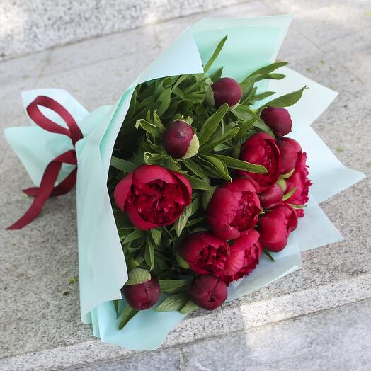 15 red peonies in designer packaging