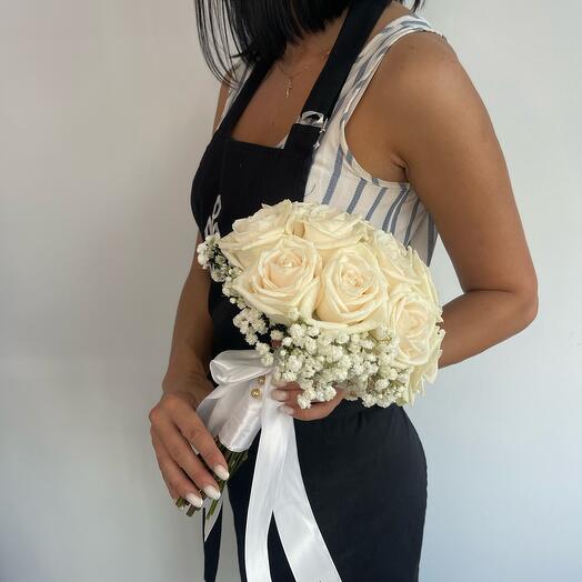 Bridal bouquet with roses and gypsophila